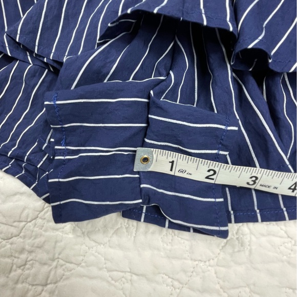 🔥Lulus Ruffle & Flow Black Striped Backless Ruffle
Romper Blue White - Picture 15 of 16